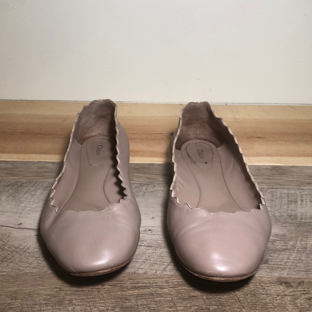 Tan flats, have been worn